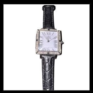 Invicta with white face and black strap